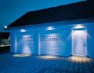 Porte de garage roulante avec lames isolées