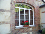 Fenêtre PVC blanc, cintre anse de panier