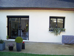 Menuiseries aluminium et volets roulants noirs RAL 9005