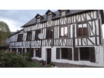 Menuiseries en PVC imitation chêne foncé