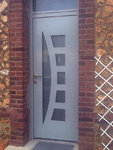 Porte d'entrée en aluminium avec imposte